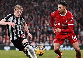 Liverpool Secures Three-Point Lead in Premier League After Controversial Win Against Newcastle